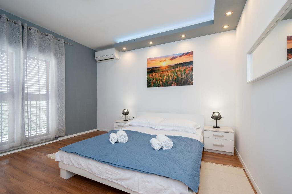 Postel nebo postele na pokoji v ubytování Apartment Dalmatino