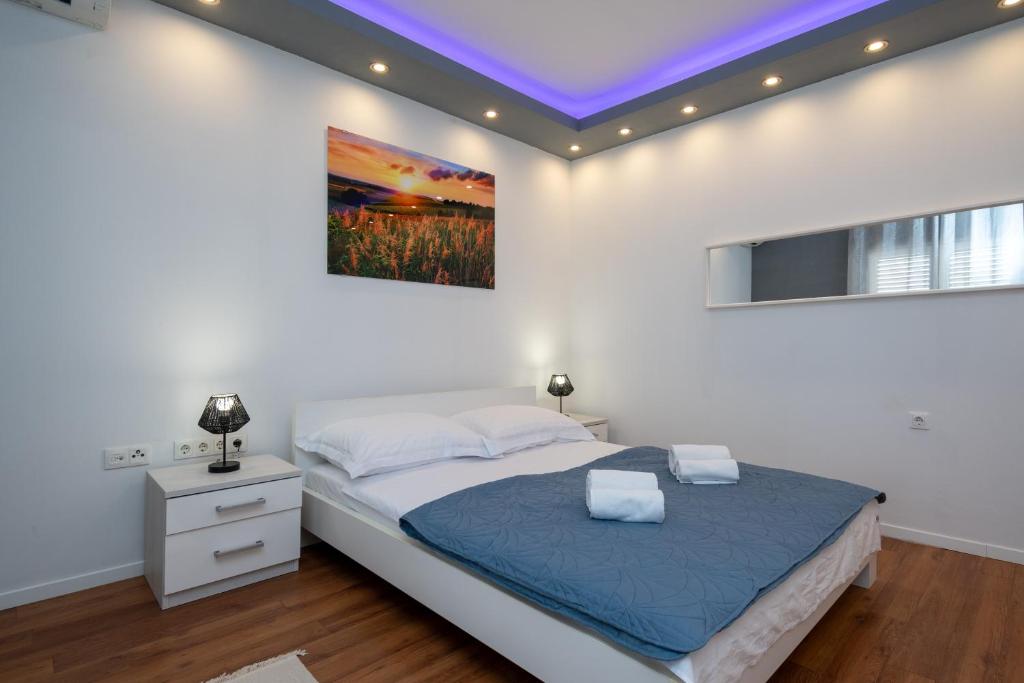 Postel nebo postele na pokoji v ubytování Apartment Dalmatino