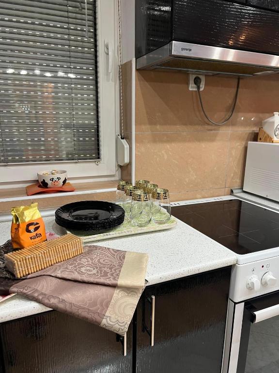 Kuchyň nebo kuchyňský kout v ubytování BIG Apartman