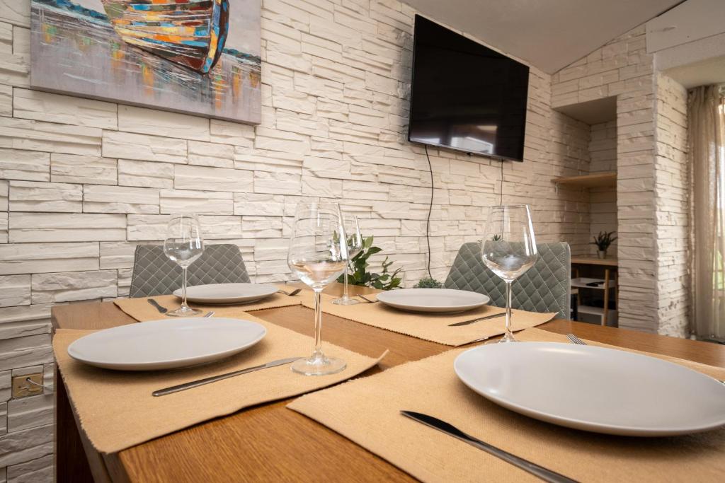 TV a/nebo společenská místnost v ubytování Apartment Dalmatino