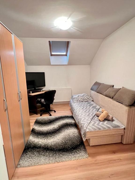 Postel nebo postele na pokoji v ubytování BIG Apartman