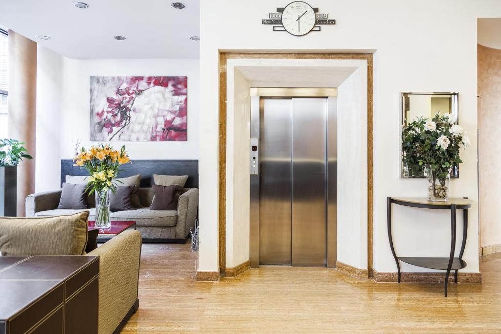 Posezení v ubytování Hotel Des Etrangers