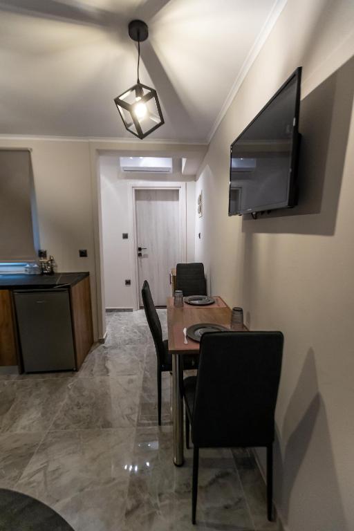 TV a/nebo společenská místnost v ubytování K&M Villas