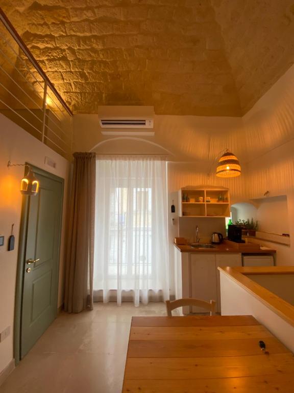Kuchyň nebo kuchyňský kout v ubytování A Casa del Console apartment