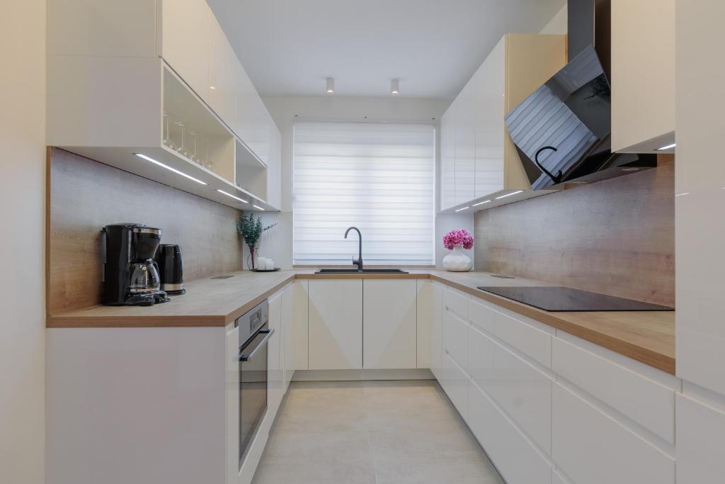 Kuchyň nebo kuchyňský kout v ubytování Apartments Rusula Zadar