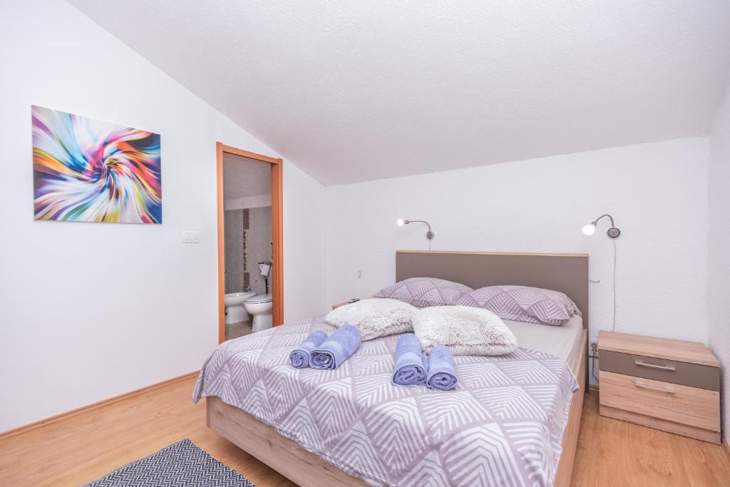 Postel nebo postele na pokoji v ubytování Villa Lino