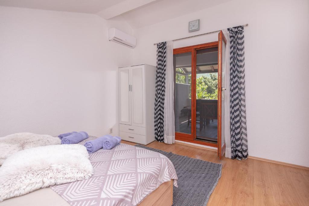 Postel nebo postele na pokoji v ubytování Villa Lino