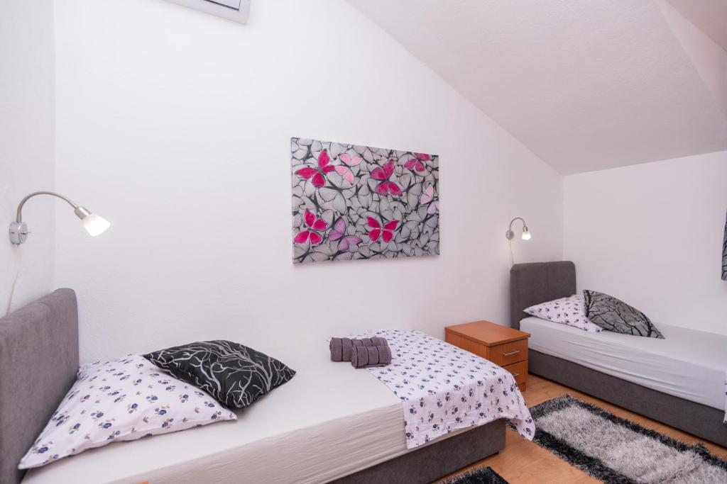 Postel nebo postele na pokoji v ubytování Villa Lino