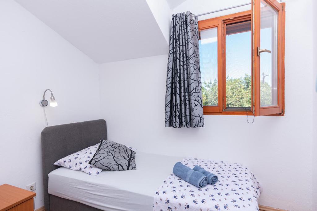 Postel nebo postele na pokoji v ubytování Villa Lino