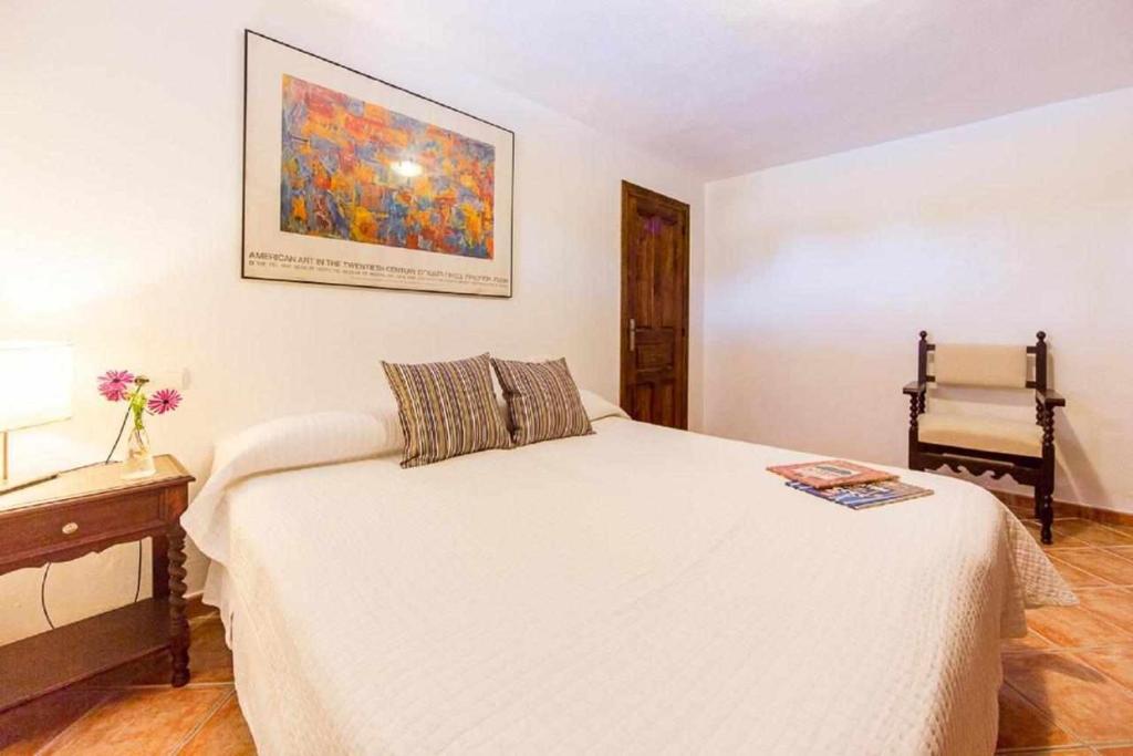 A bed or beds in a room at Finca Cas Contador Mallorca
