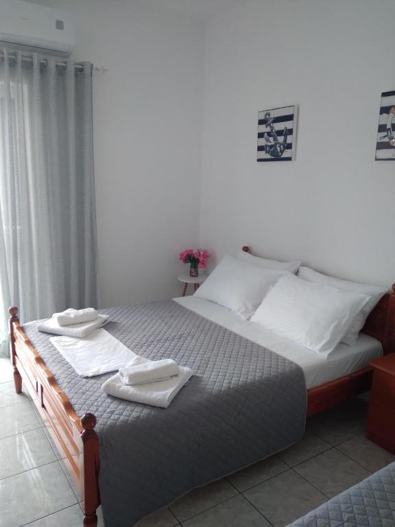 Postel nebo postele na pokoji v ubytování NaDim rooms