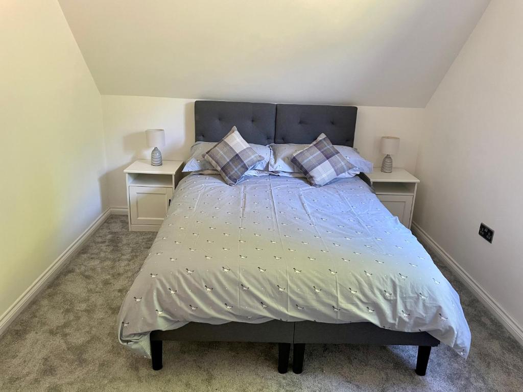 Postel nebo postele na pokoji v ubytování Còsagach Flat near Oban