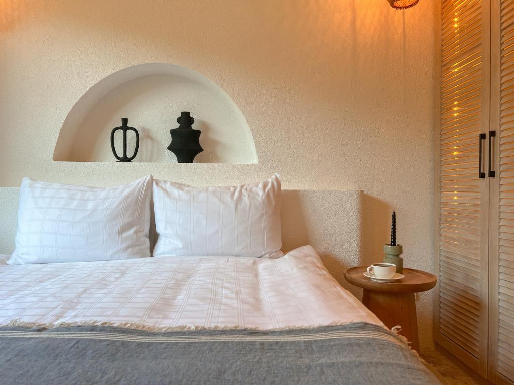 Postel nebo postele na pokoji v ubytování IZZ Getaway - Adults Only