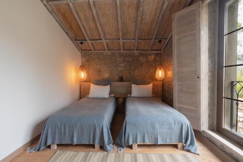Postel nebo postele na pokoji v ubytování IZZ Getaway - Adults Only