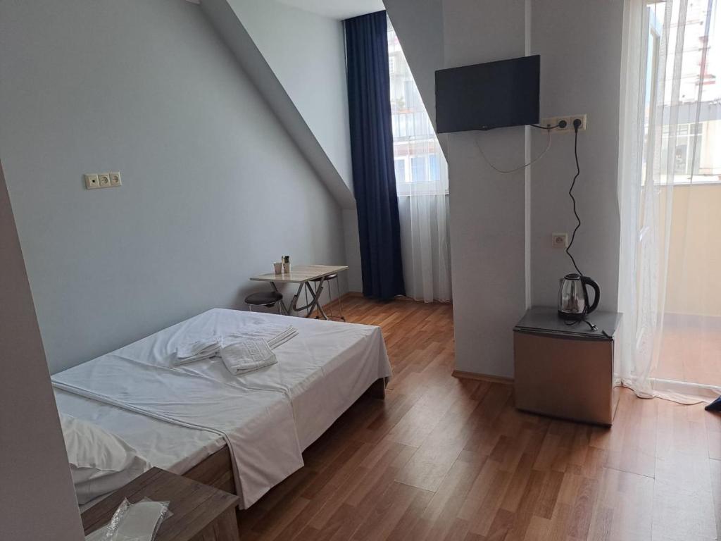 Postel nebo postele na pokoji v ubytování Hotel Zundaga