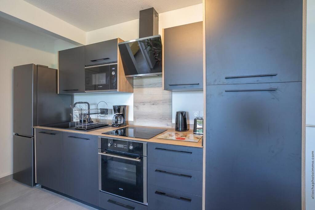 Kuchyň nebo kuchyňský kout v ubytování Navira - Appartement le Pavillon