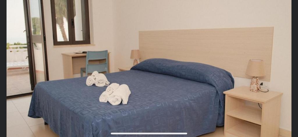 Postel nebo postele na pokoji v ubytování Hotel Diamond Residence