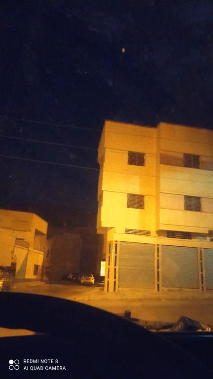 a building in front of a building at night at مدينه صفرو المغرب in Sefrou