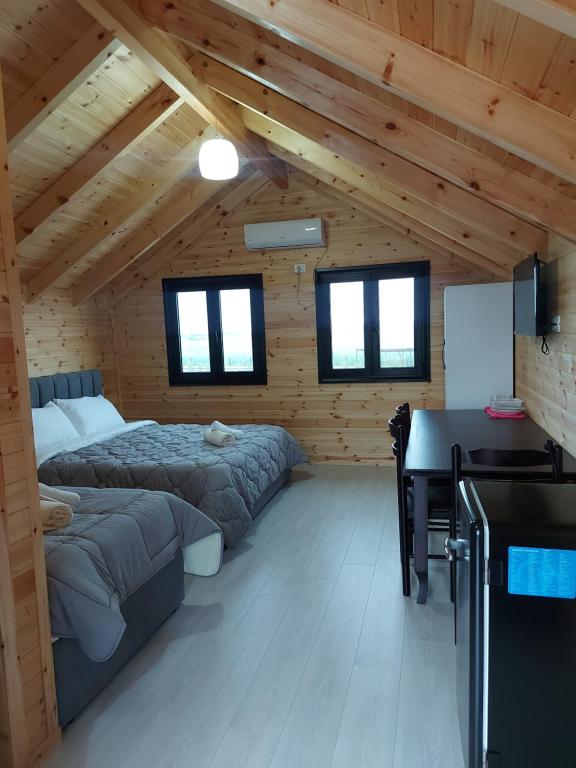 Postel nebo postele na pokoji v ubytování Beni Rooms Tale