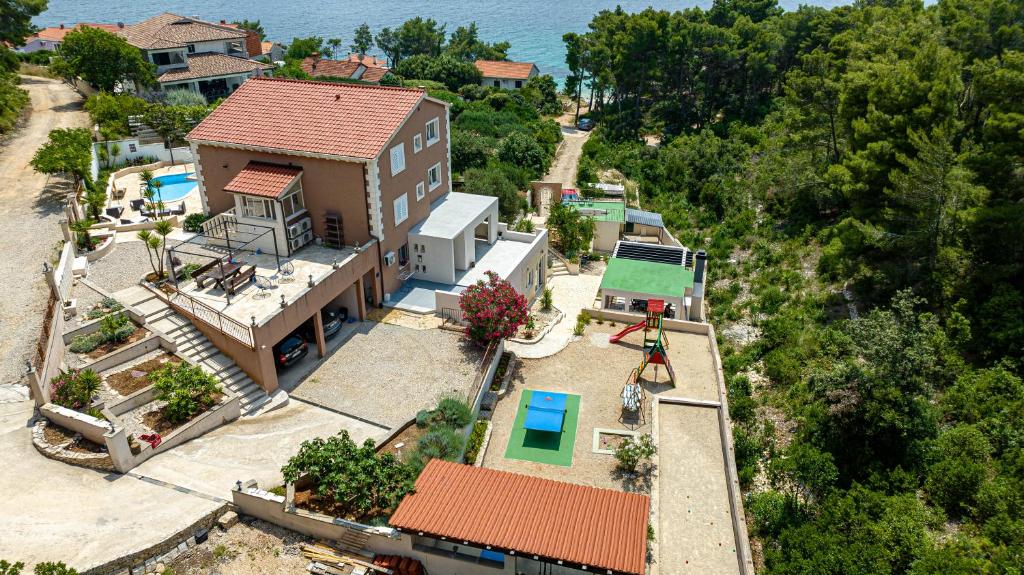 an aerial view of a house with a pool at Villa Milina Korcula in Vela Luka