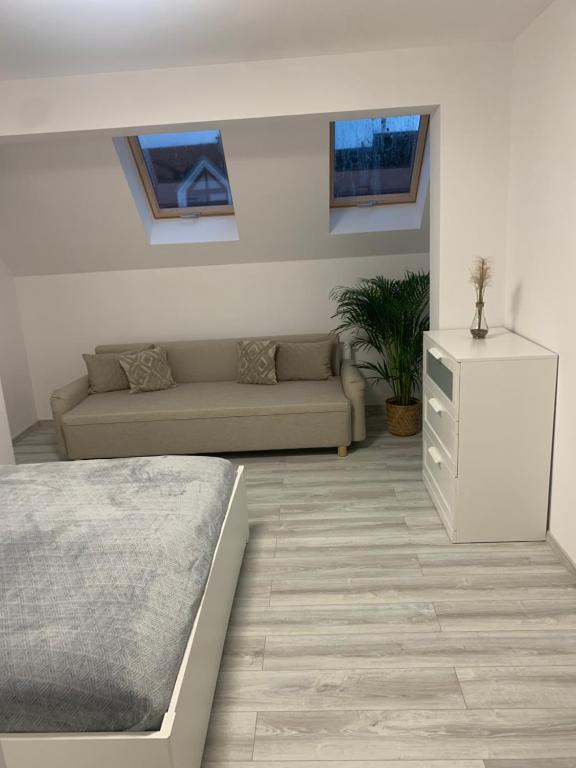 Postel nebo postele na pokoji v ubytování Apartamenty Przy Deptaku