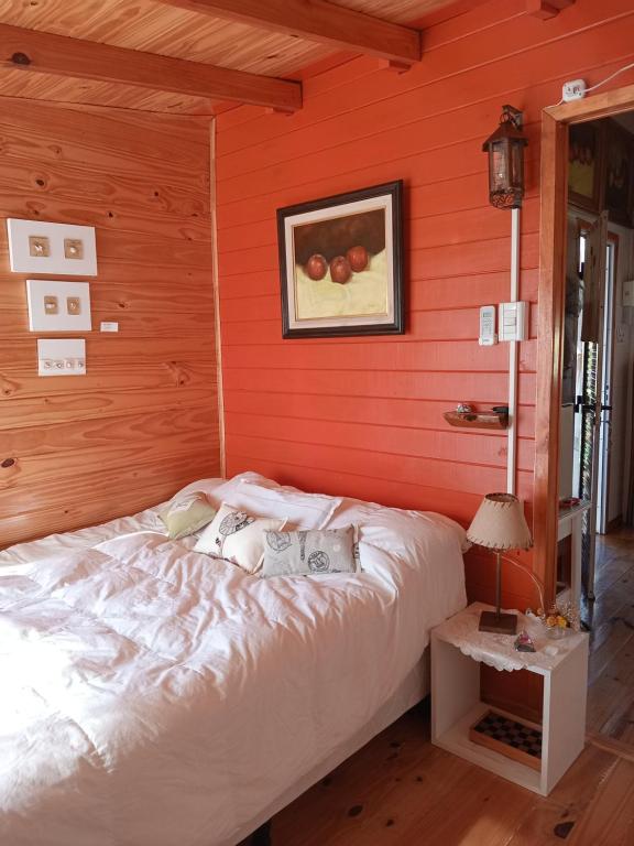 Giường trong phòng chung tại Cabaña La Paz