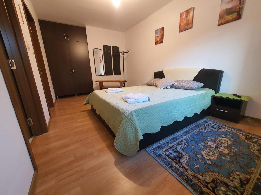 Postel nebo postele na pokoji v ubytování Pensiunea Geta
