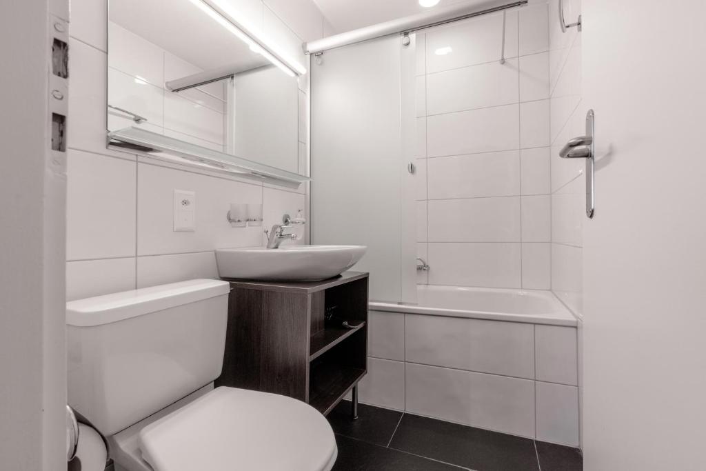 Koupelna v ubytování Pension Arosa - Self Check-In