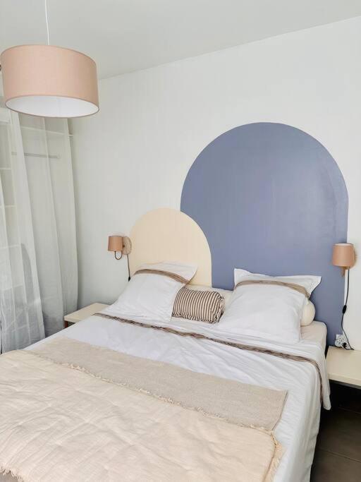 Postel nebo postele na pokoji v ubytování Villa Malibou