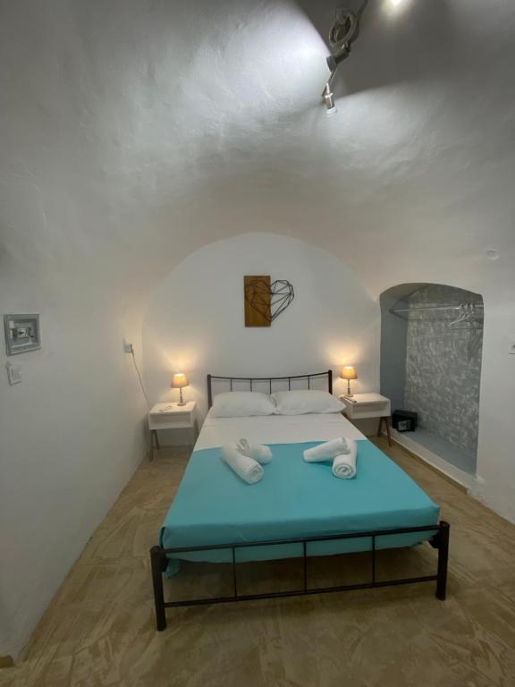 Postel nebo postele na pokoji v ubytování Cueva Con Vista Studios