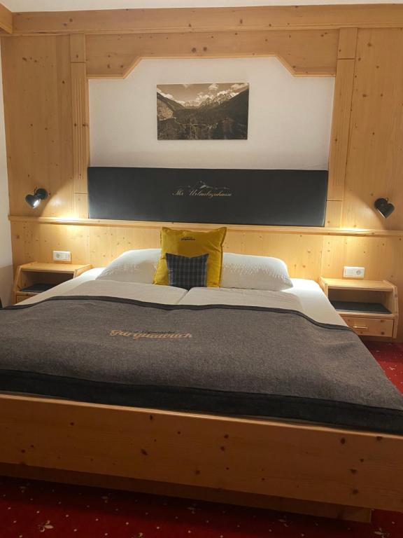 Postel nebo postele na pokoji v ubytování Alpenhotel Gurgltalblick