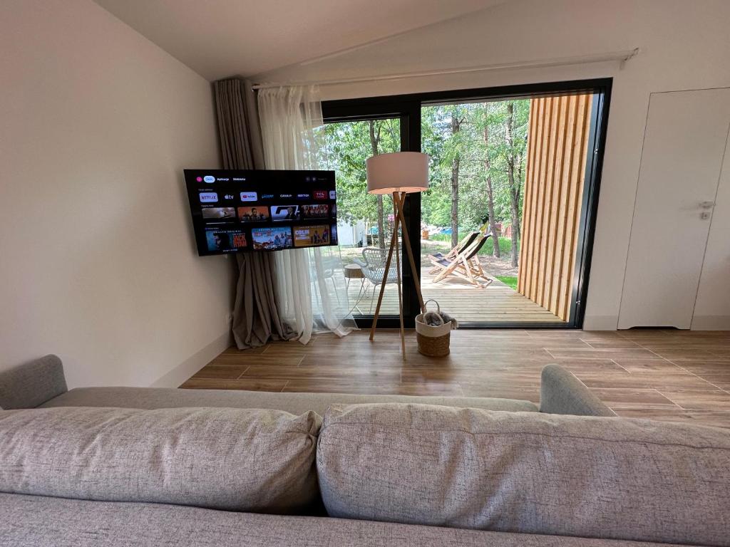 TV a/nebo společenská místnost v ubytování Camping Swory