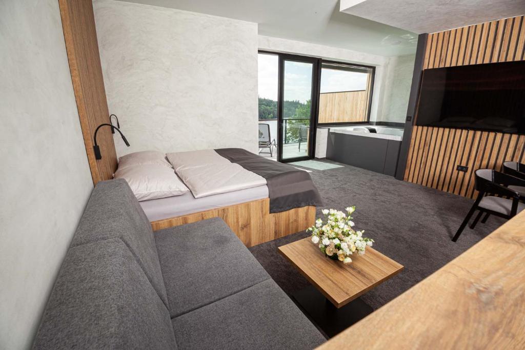 Voodi või voodid majutusasutuse Hotel Kras toas