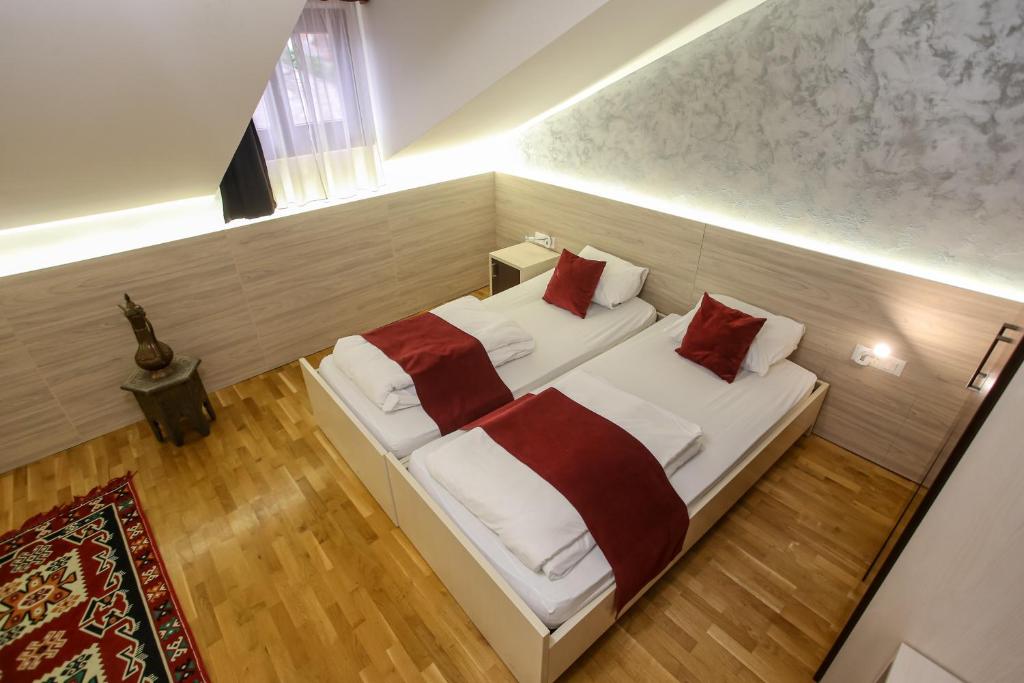 Postel nebo postele na pokoji v ubytování Hotel Emen