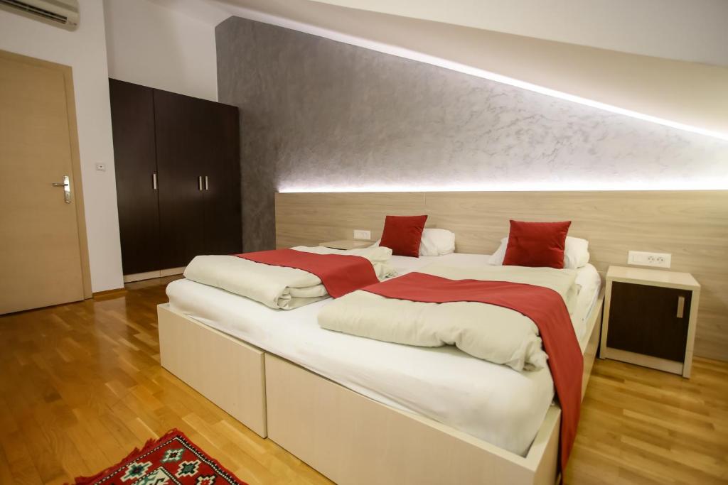 Postel nebo postele na pokoji v ubytování Hotel Emen