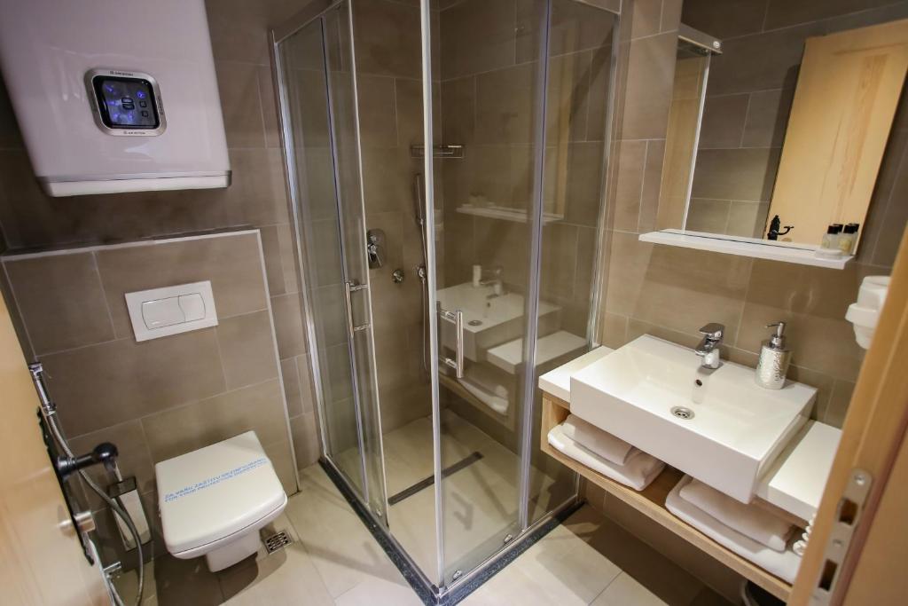 Koupelna v ubytování Hotel Emen