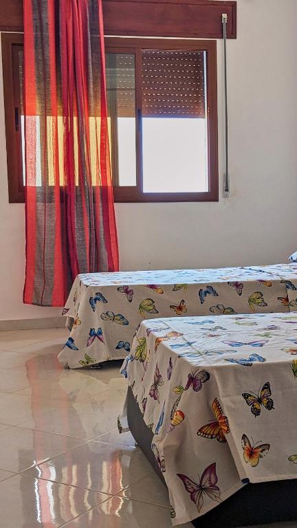 Postel nebo postele na pokoji v ubytování Oued Laou Apartment