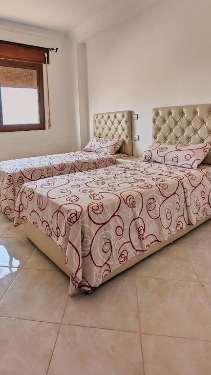 Postel nebo postele na pokoji v ubytování Oued Laou Apartment