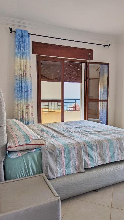 Postel nebo postele na pokoji v ubytování Oued Laou Apartment