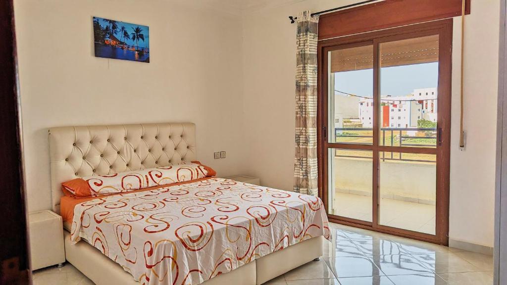 Postel nebo postele na pokoji v ubytování Oued Laou Apartment