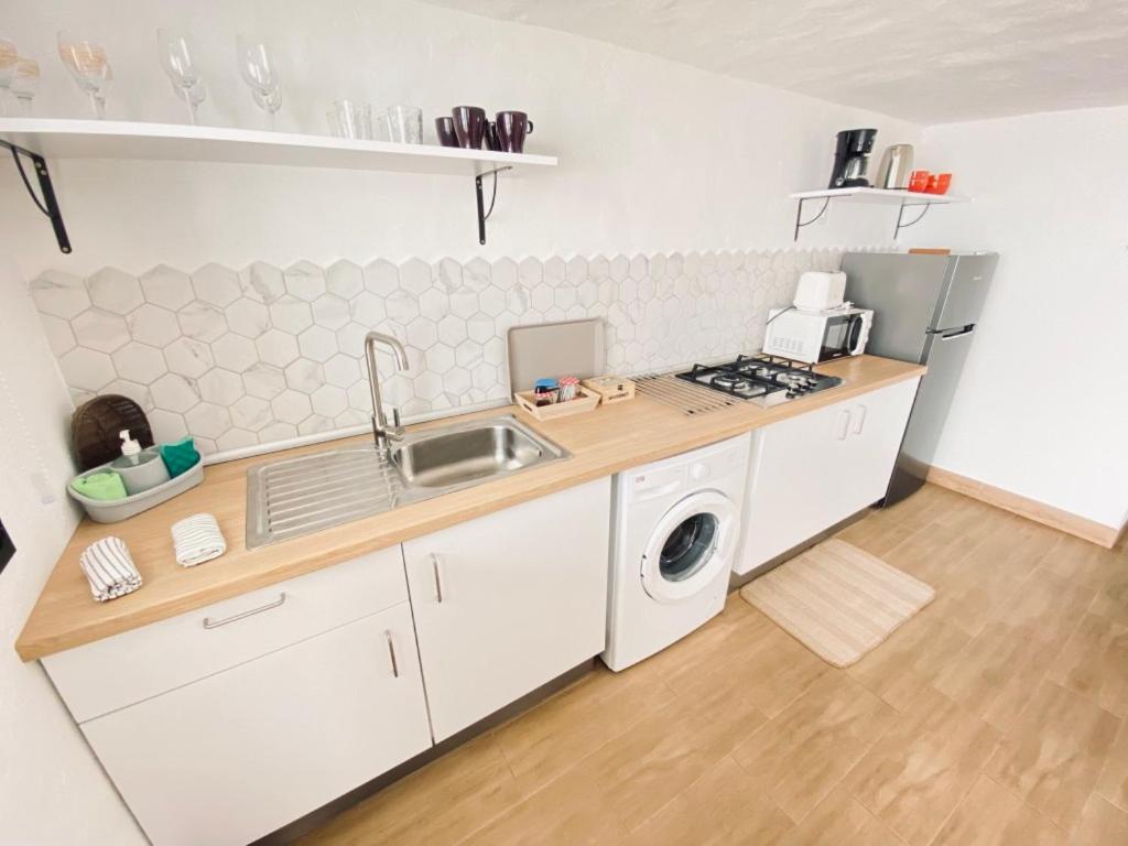 Kuchyňa alebo kuchynka v ubytovaní Casa Gercko 3