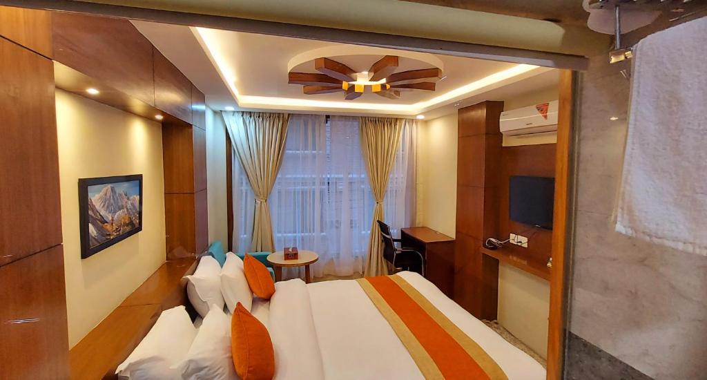 Postel nebo postele na pokoji v ubytování Hotel Yakroo Manang