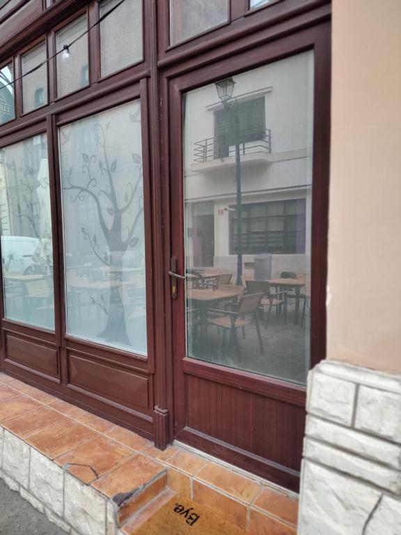 a sliding glass door with a view of a patio at elefant in Baia Mare