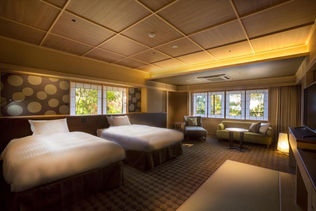 Hotel Yuraku Kyo-yasakaにあるベッド