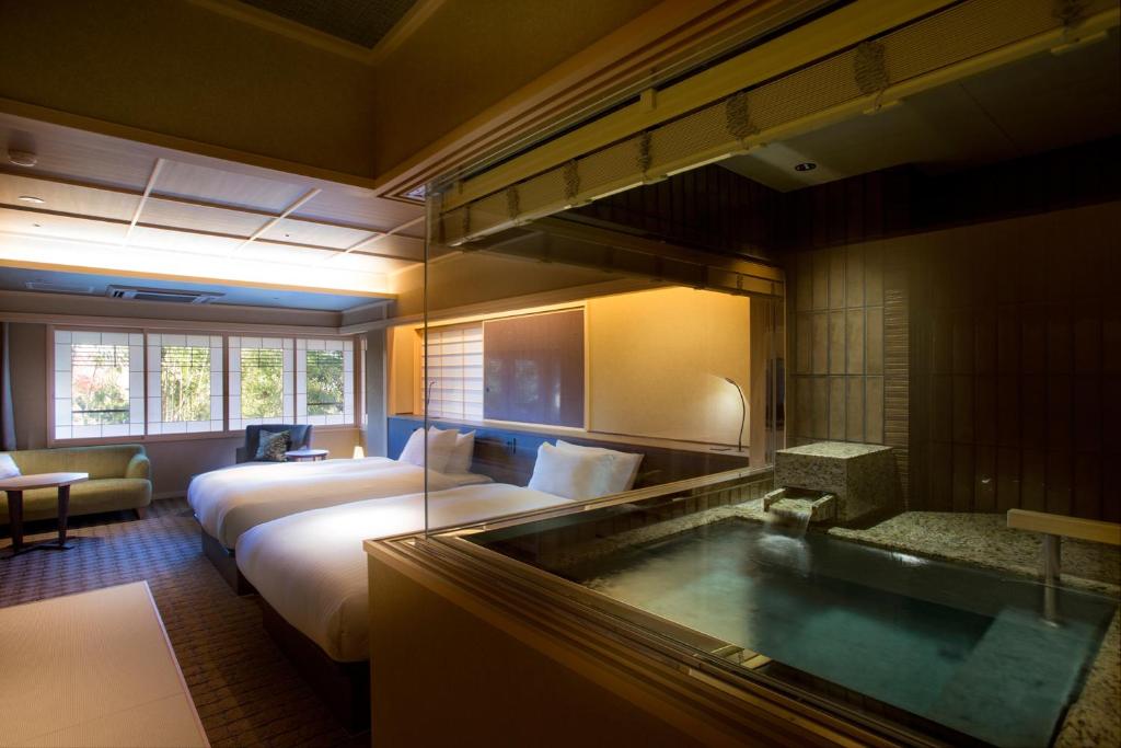 Hotel Yuraku Kyo-yasakaにあるベッド