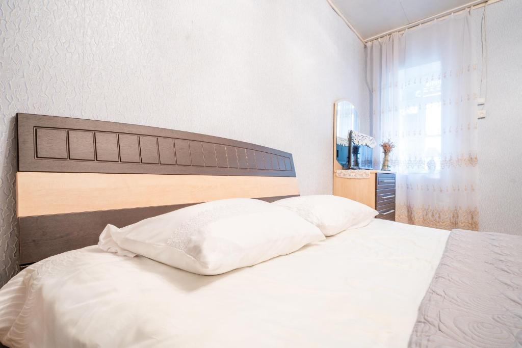Postel nebo postele na pokoji v ubytování GuestHouse NaSHGOBI
