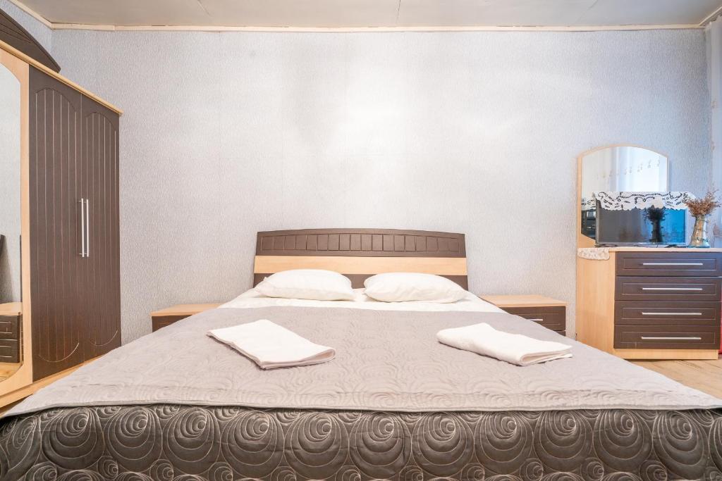 Postel nebo postele na pokoji v ubytování GuestHouse NaSHGOBI