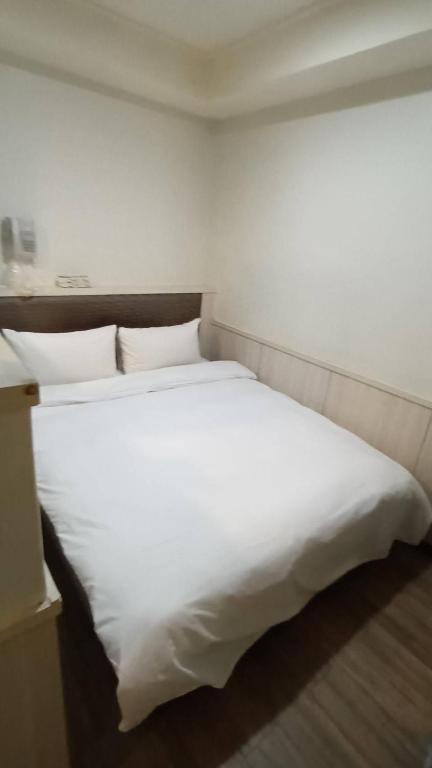 Postel nebo postele na pokoji v ubytování Galaxy Mini Inn