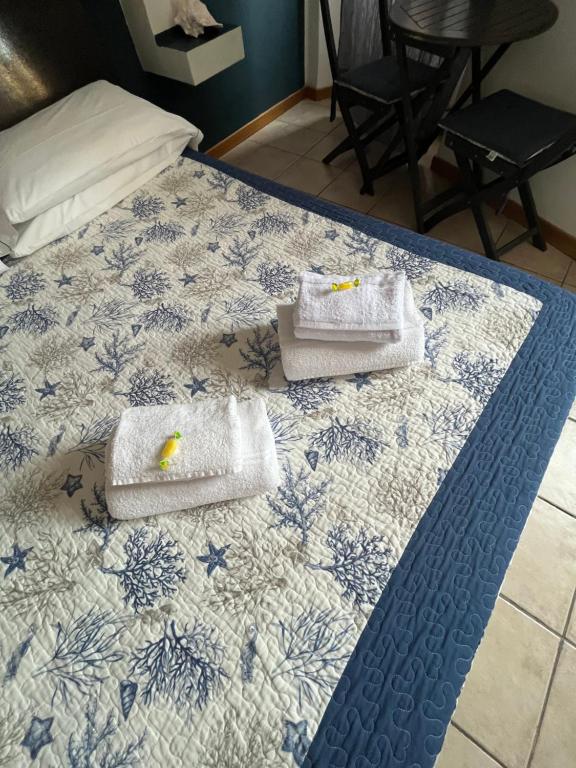 Postel nebo postele na pokoji v ubytování Lisetta Rooms