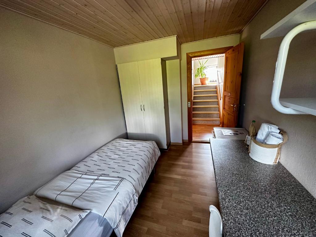 Postel nebo postele na pokoji v ubytování OJ Home